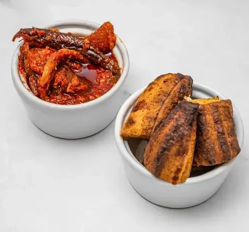 Roasted Plaintain and peppered sauce